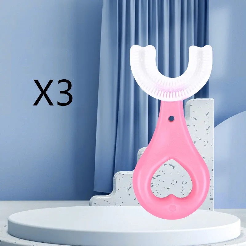 Children's U-shaped food grade soft rubber toothbrush in pink and blue for ages 2-12