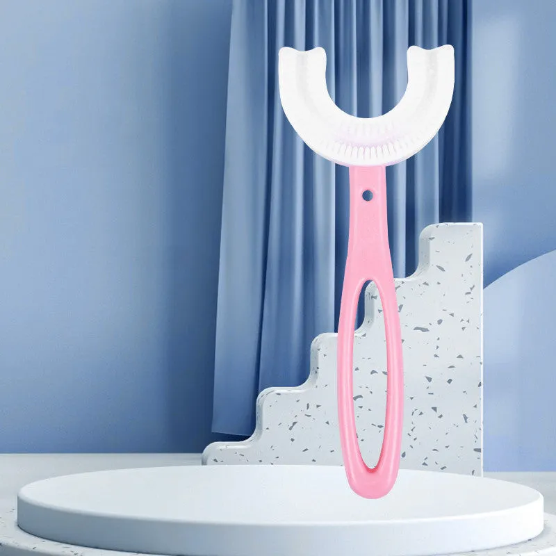Children's U-shaped food grade soft rubber toothbrush in pink and blue for ages 2-12