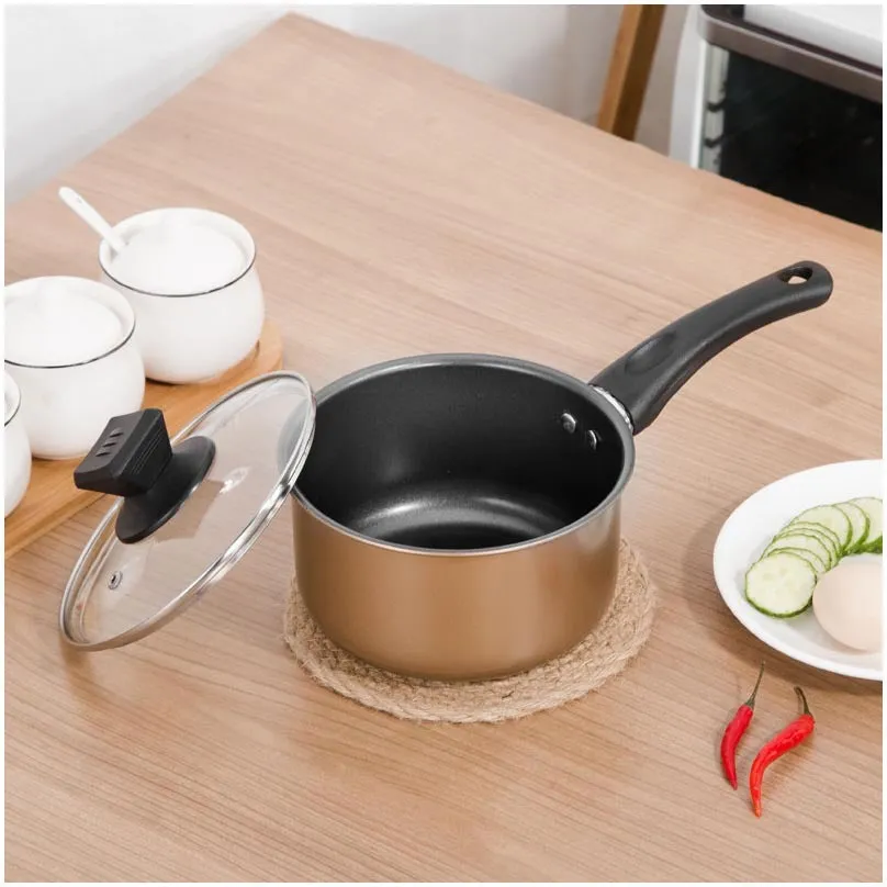 Three-piece cast iron cookware set with soup pot, milk pot and wok featuring non-stick coating