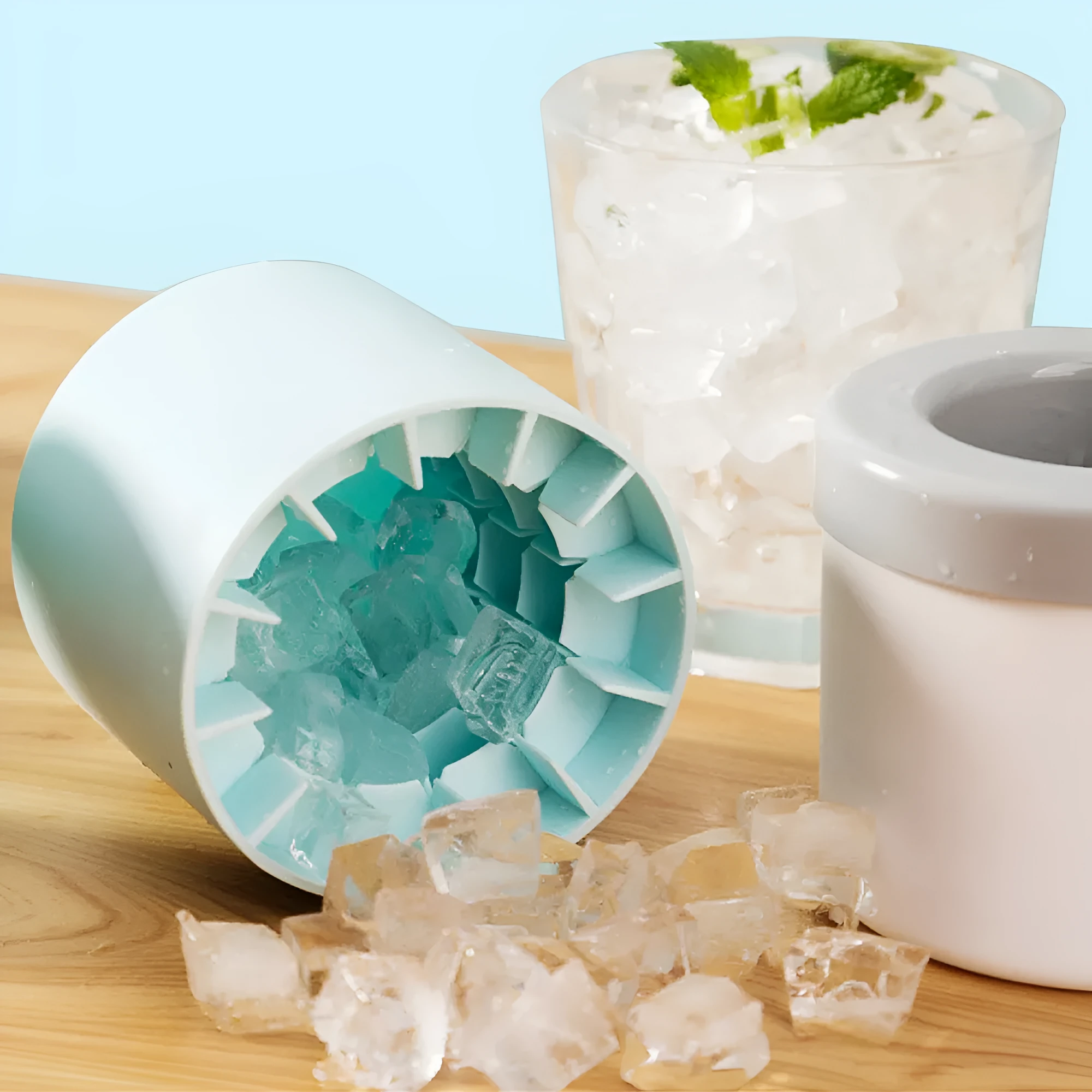 Blue-green portable 2-in-1 ice bucket and mould with lid showing 9 cm diameter and quick-freeze design