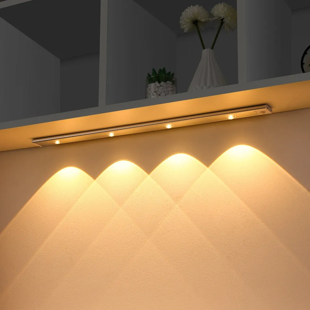 Ultra-thin USB LED night light with motion sensor in silver or black, showing magnet attachment for cabinets