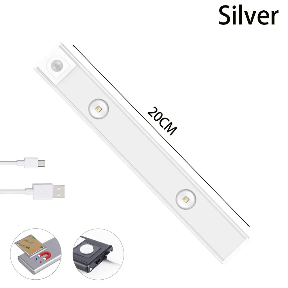 Ultra-thin USB LED night light with motion sensor in silver or black, showing magnet attachment for cabinets