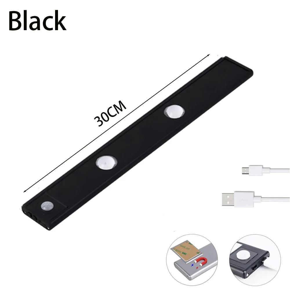 Ultra-thin USB LED night light with motion sensor in silver or black, showing magnet attachment for cabinets