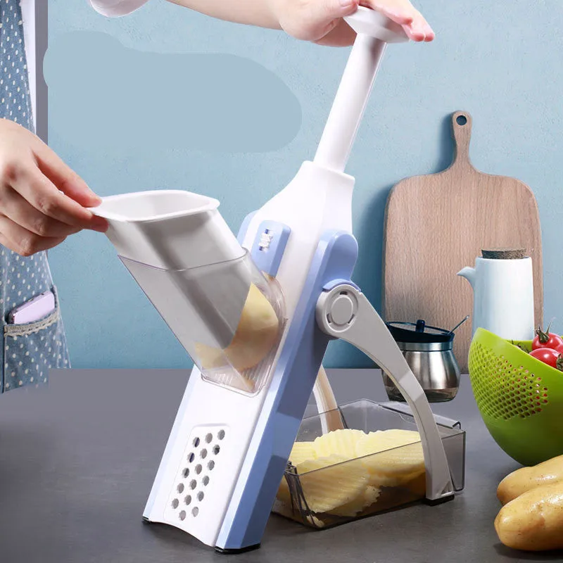 White and blue multifunctional vegetable slicer with stainless steel blades on a kitchen counter