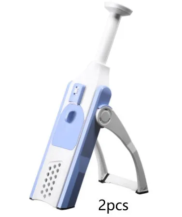 White and blue multifunctional vegetable slicer with stainless steel blades on a kitchen counter