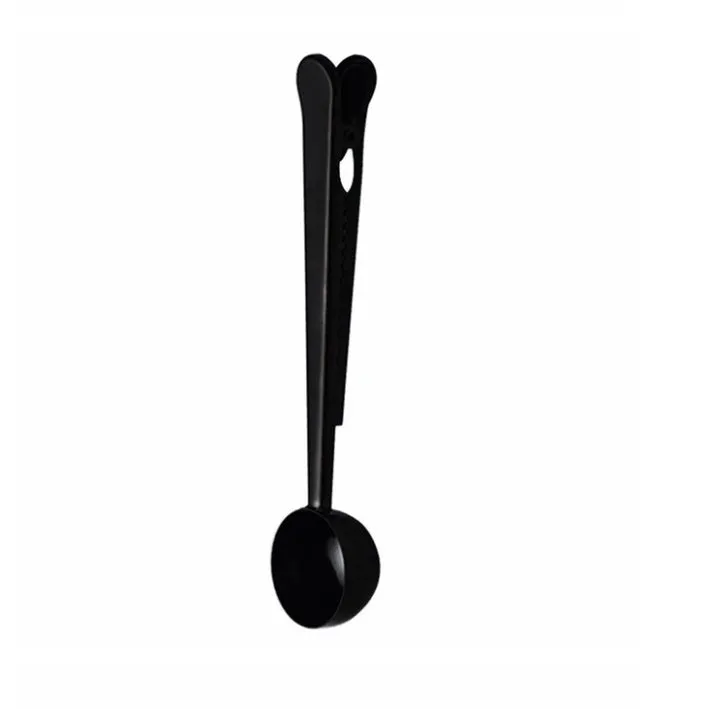 Stainless steel coffee clip spoon showing scoop and bag clip design, 17.5 cm long.