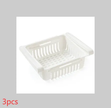 Blue telescopic refrigerator storage basket with adjustable width from 22cm to 34cm on a kitchen counter