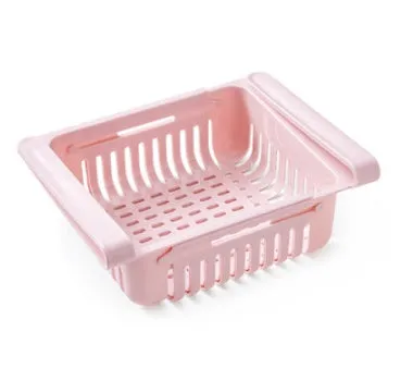 Blue telescopic refrigerator storage basket with adjustable width from 22cm to 34cm on a kitchen counter