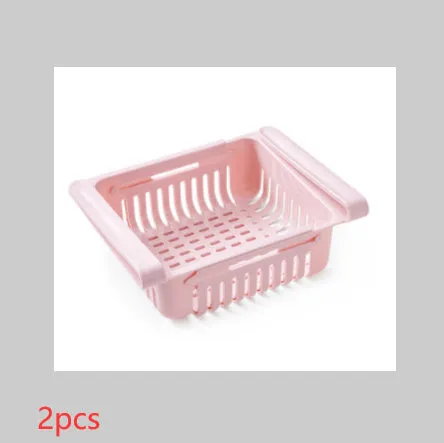 Blue telescopic refrigerator storage basket with adjustable width from 22cm to 34cm on a kitchen counter