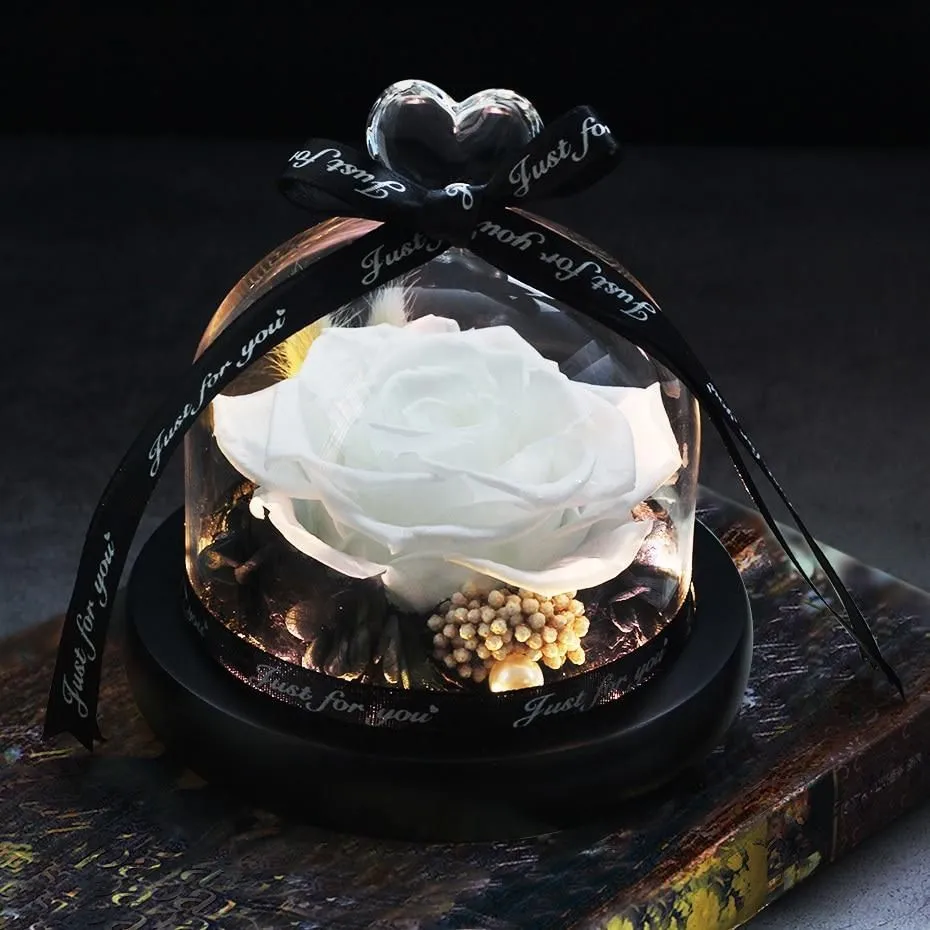 Eternal real rose with LED light inside a 13x13x12cm transparent glass dome, available in multiple colours