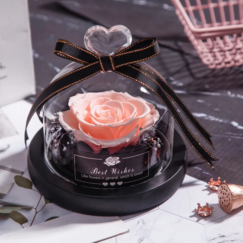 Eternal real rose with LED light inside a 13x13x12cm transparent glass dome, available in multiple colours