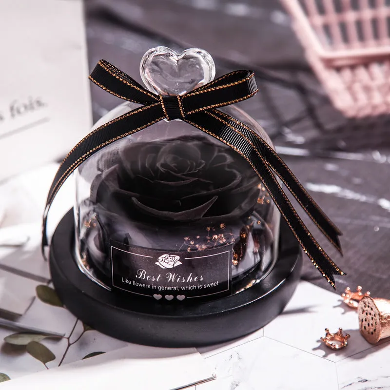 Eternal real rose with LED light inside a 13x13x12cm transparent glass dome, available in multiple colours