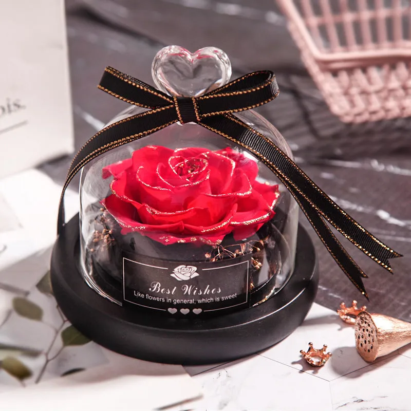 Eternal real rose with LED light inside a 13x13x12cm transparent glass dome, available in multiple colours