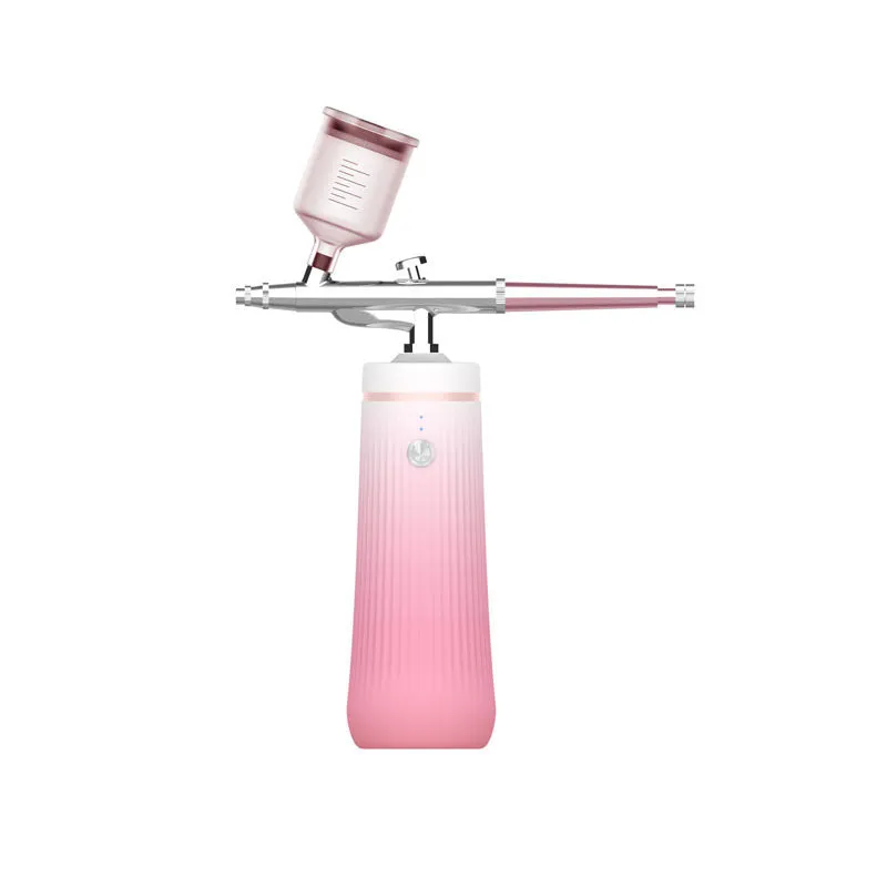 Oxygen infusion device in gradient pink with USB charging port and cold spray nozzle