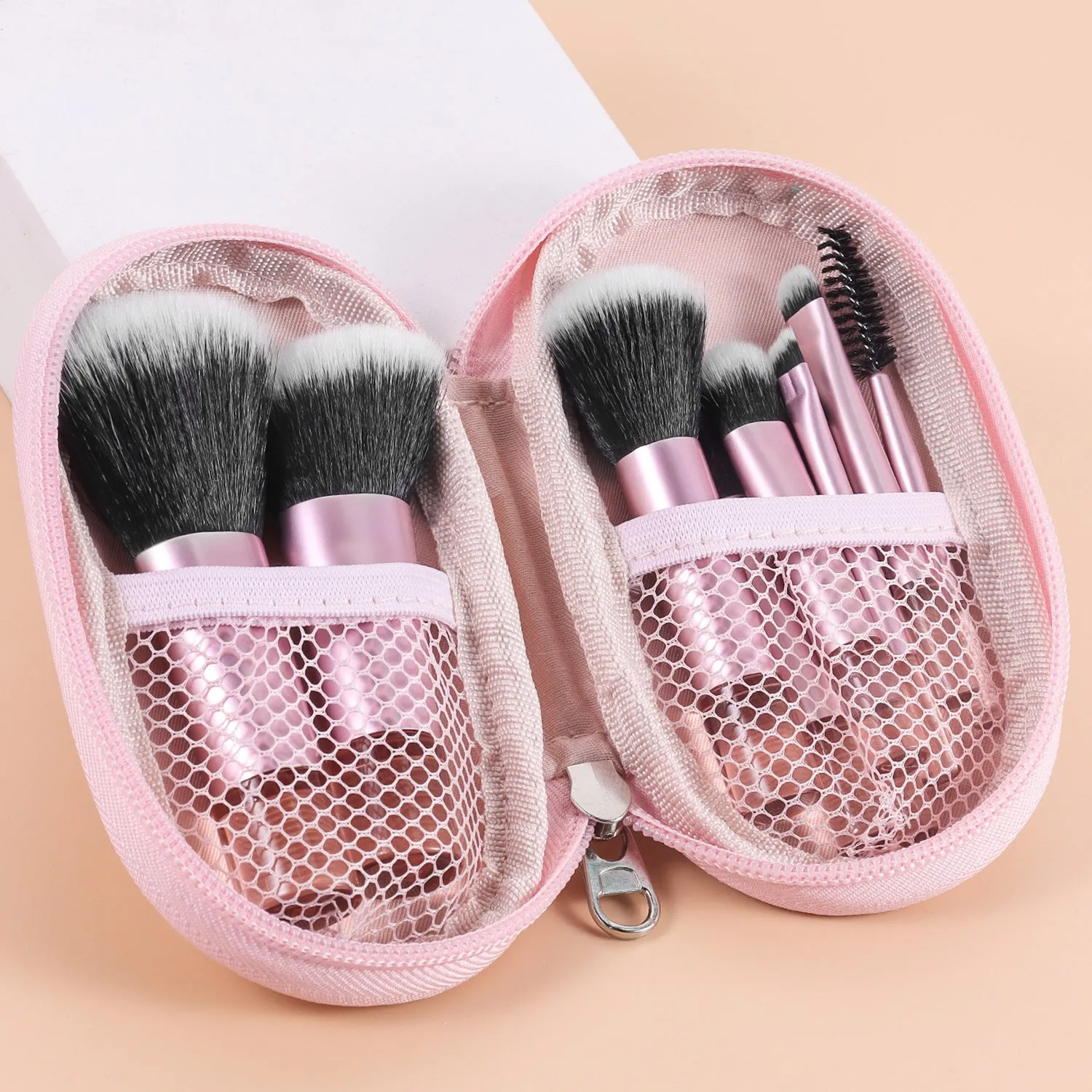 10-piece makeup brush set with fibre bristles, aluminium tubes, and crystal handles, plus a storage bag