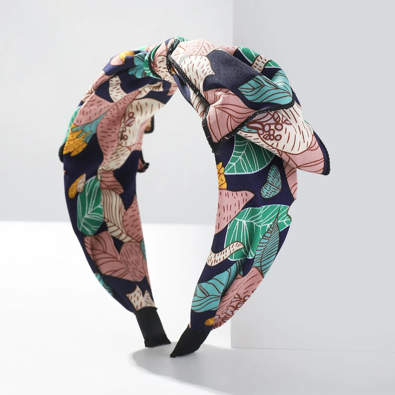 Handmade cloth hair bow with printed orchid and daisy flowers in pastoral style for women