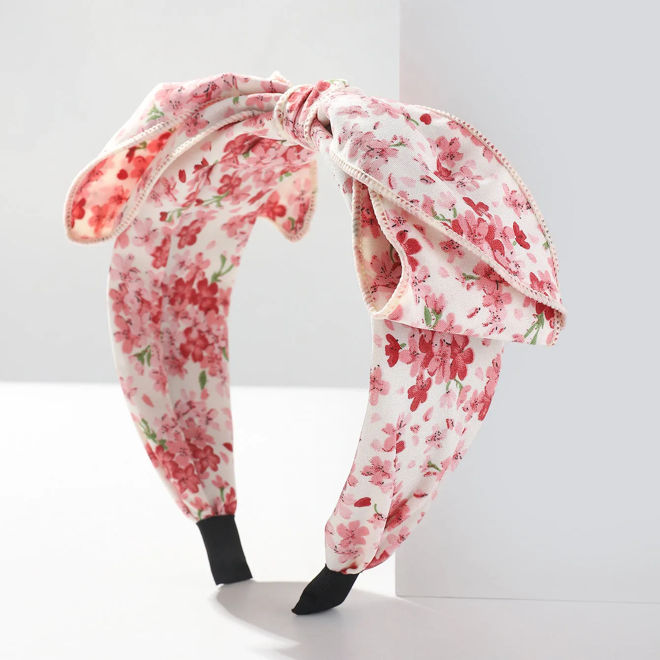 Handmade cloth hair bow with printed orchid and daisy flowers in pastoral style for women