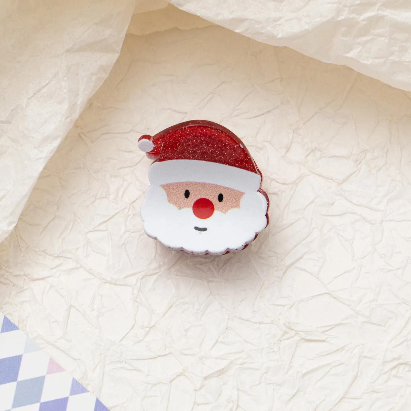Oil-finished acrylic Christmas series small jaw clip barrette with snowflake design on white background