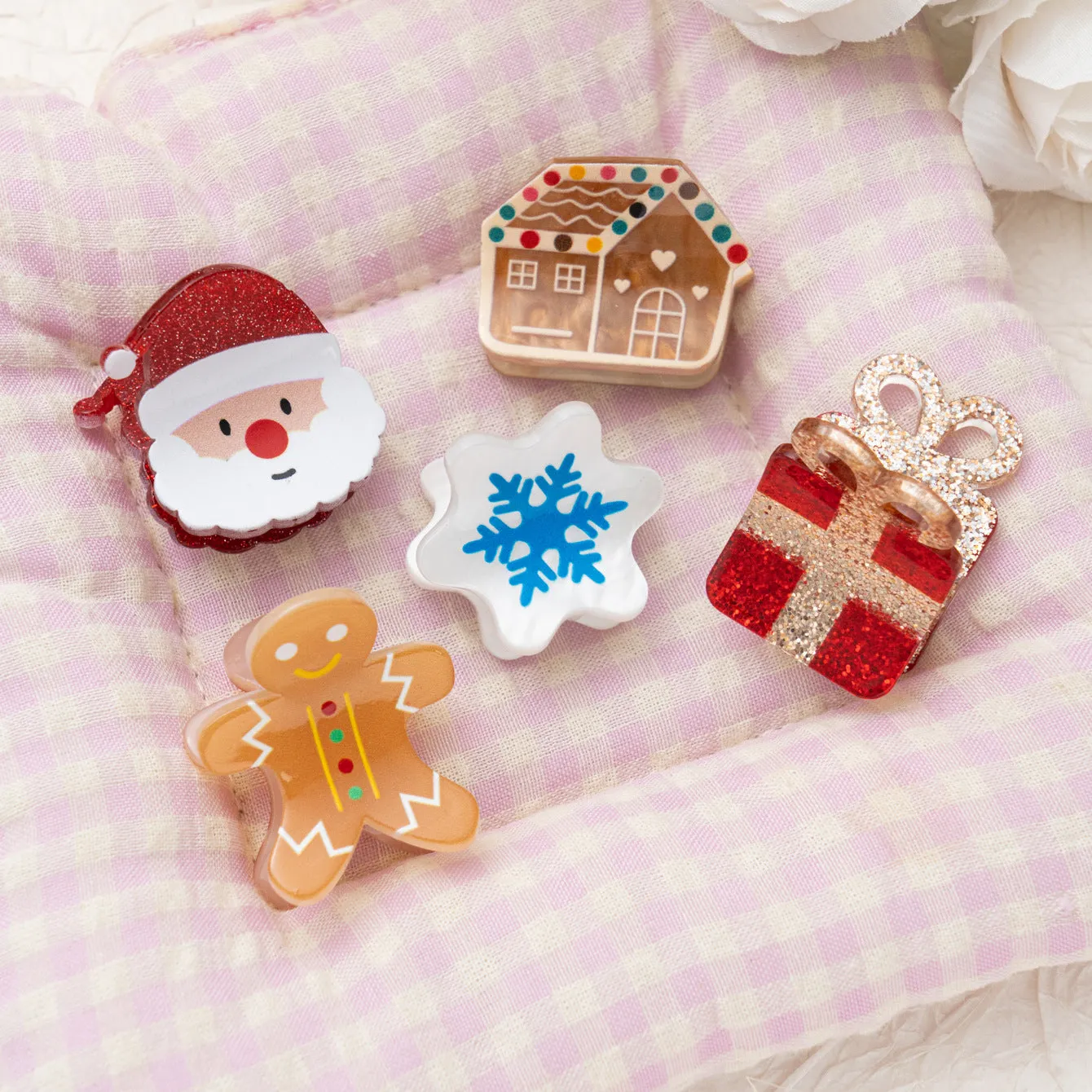 Oil-finished acrylic Christmas series small jaw clip barrette with snowflake design on white background