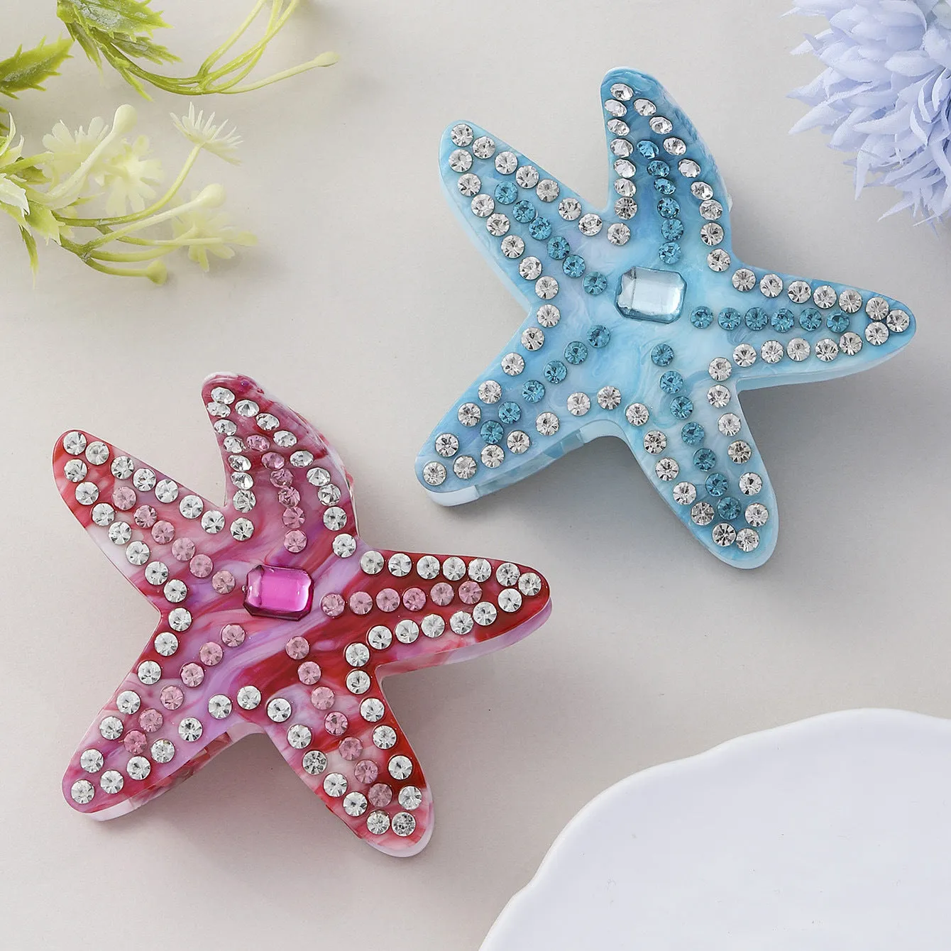 Acrylic starfish diamond encrusted hairpin in blue and pink colour options