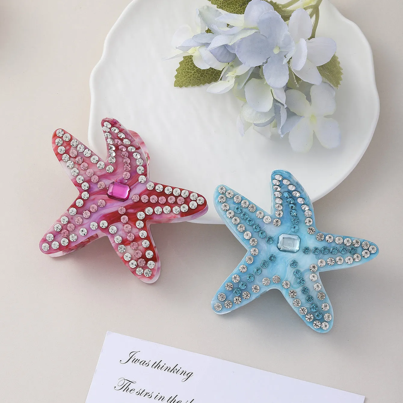 Acrylic starfish diamond encrusted hairpin in blue and pink colour options