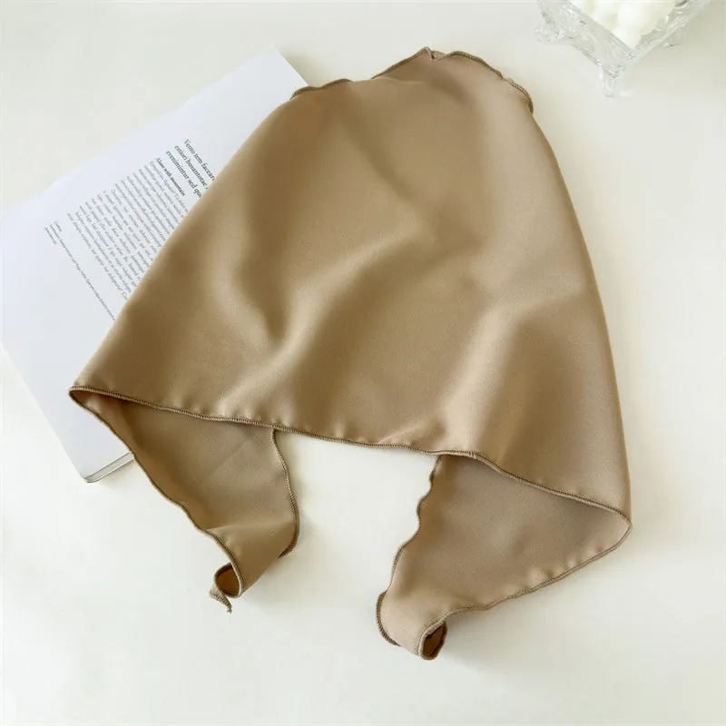 Women's solid colour triangle cloth headscarf in a neutral tone, displayed flat for easy viewing