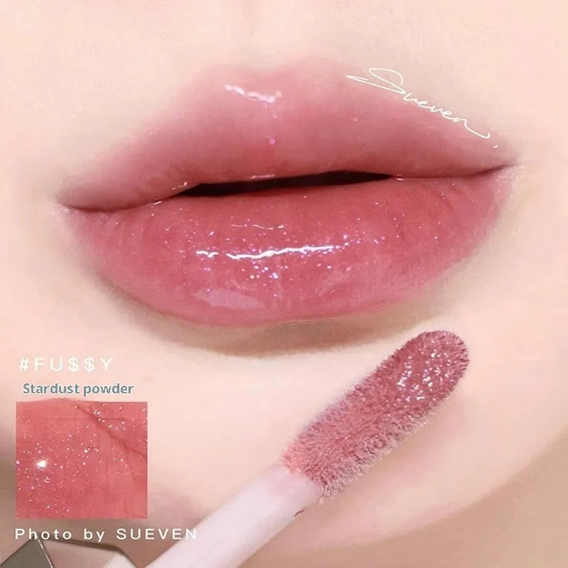 Mirror Water Light Highlight Lip Lacquer lip gloss tube with wand applicator in streamer 01 Fenty Glow