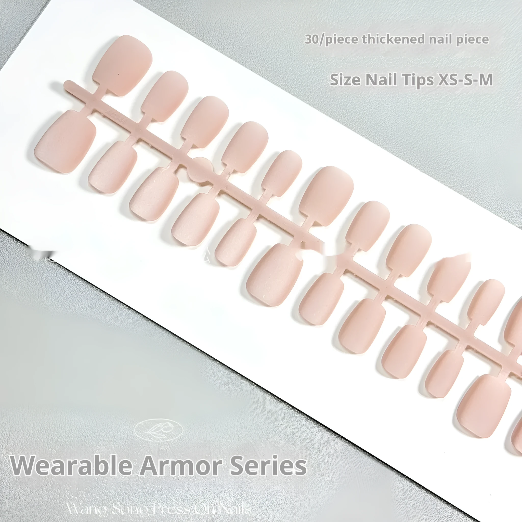 Set of false nails with frosted velvet finish and Cat's Eye designs in short ladder sizes XS, S, and M.