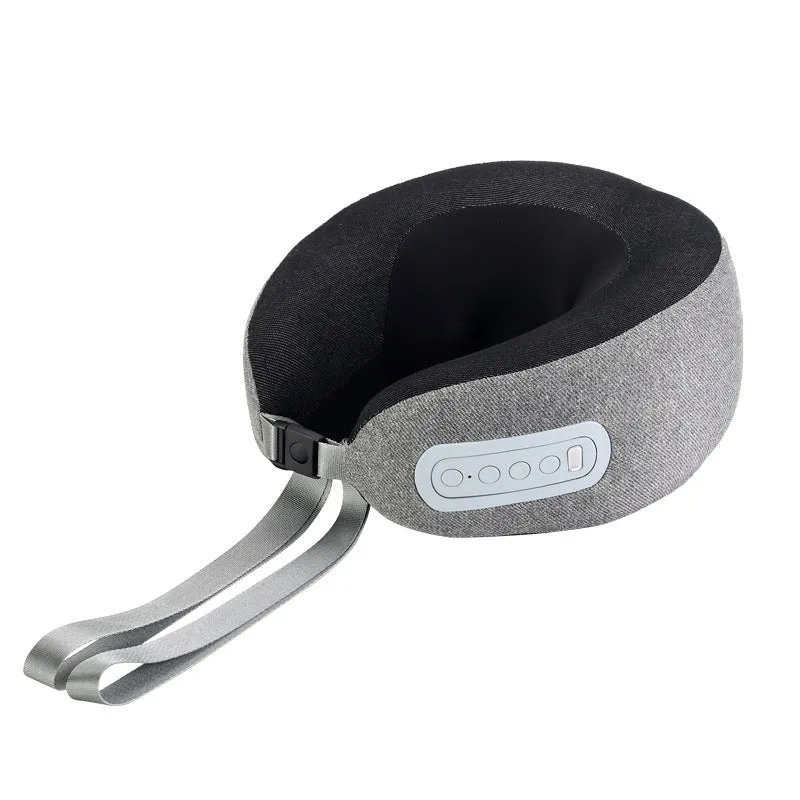 Light grey U-shaped memory foam massage pillow with USB cable on a sofa for home neck and shoulder relief
