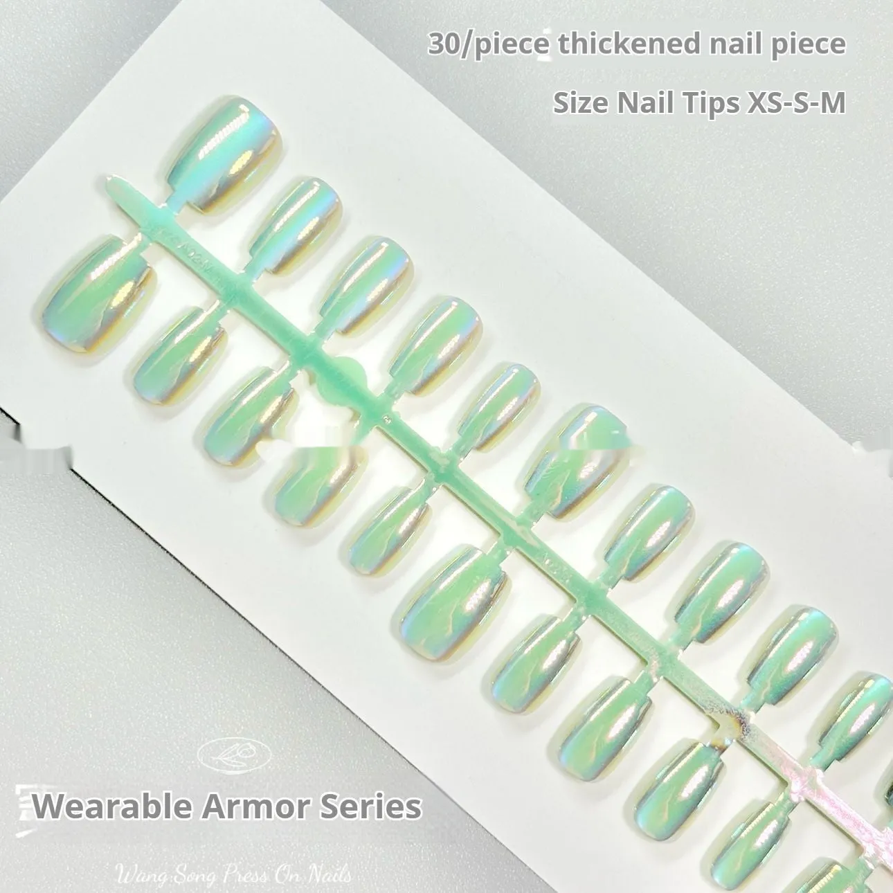 Electroplated Cat's Eye aurora effect false nail set in short ladder sizes on a display card.