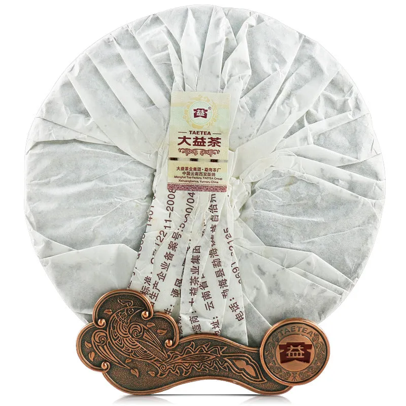 Dayi Tea 2012 raw Pu'er tea cake 357g in conventional tissue paper packaging