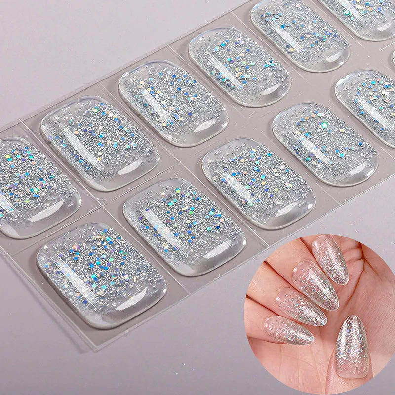 No-bake gel nail sticker set with alcohol swabs, nail file, and wooden stick on cardboard backing, showing various patterns