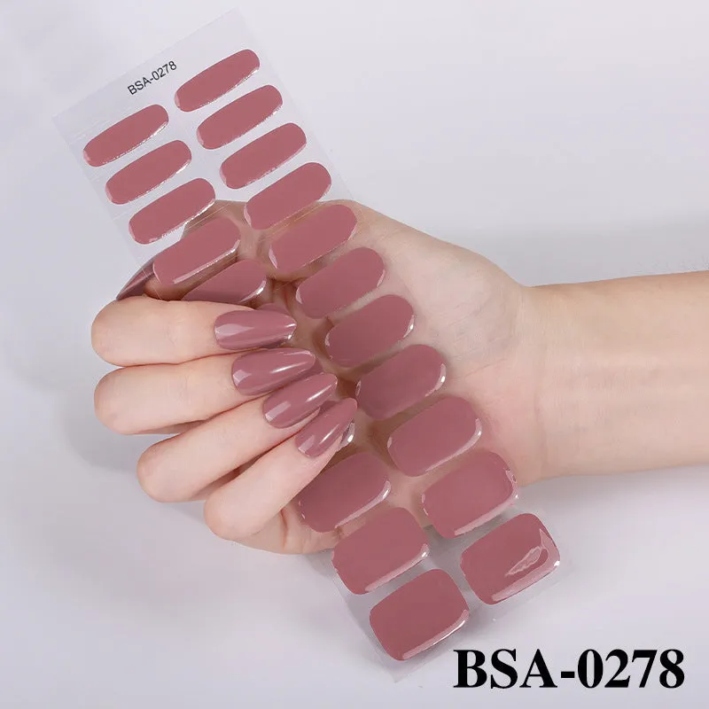 No-bake gel nail sticker set with alcohol swabs, nail file, and wooden stick on cardboard backing, showing various patterns