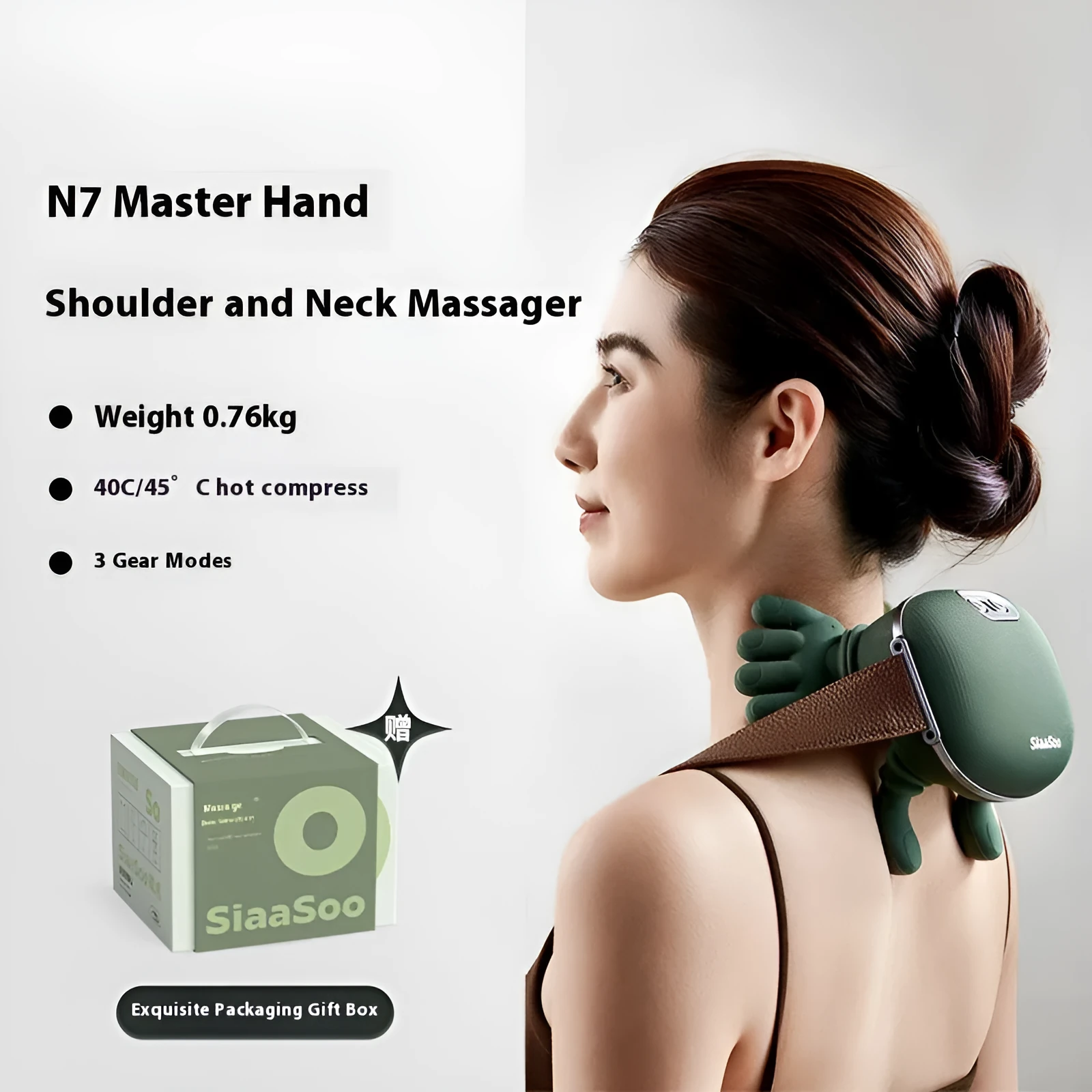 Hand shoulder neck massager, rechargeable, N7 moss green, on a table