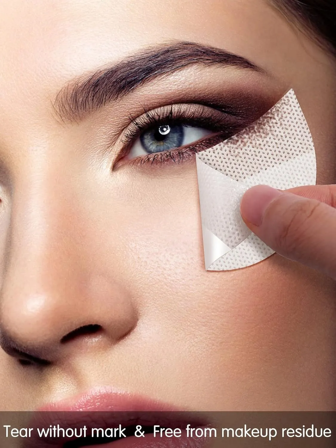 Pack of disposable half-moon shaped eyeshadow shields on a pink background