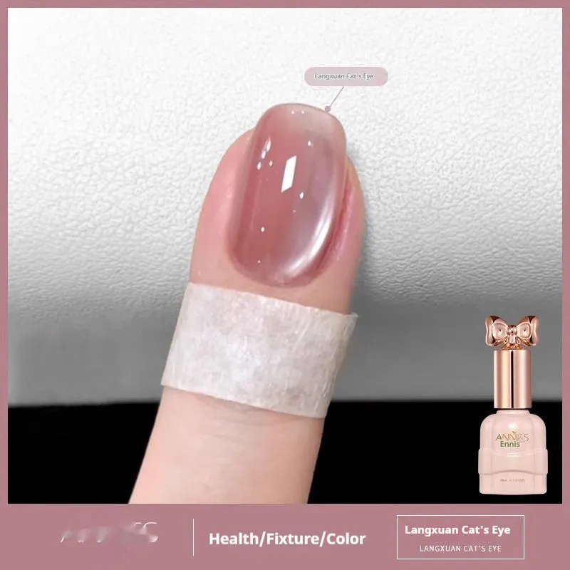 Bottle of micro glass bead cat's eye gel nail polish showing a cat's eye effect swatch.