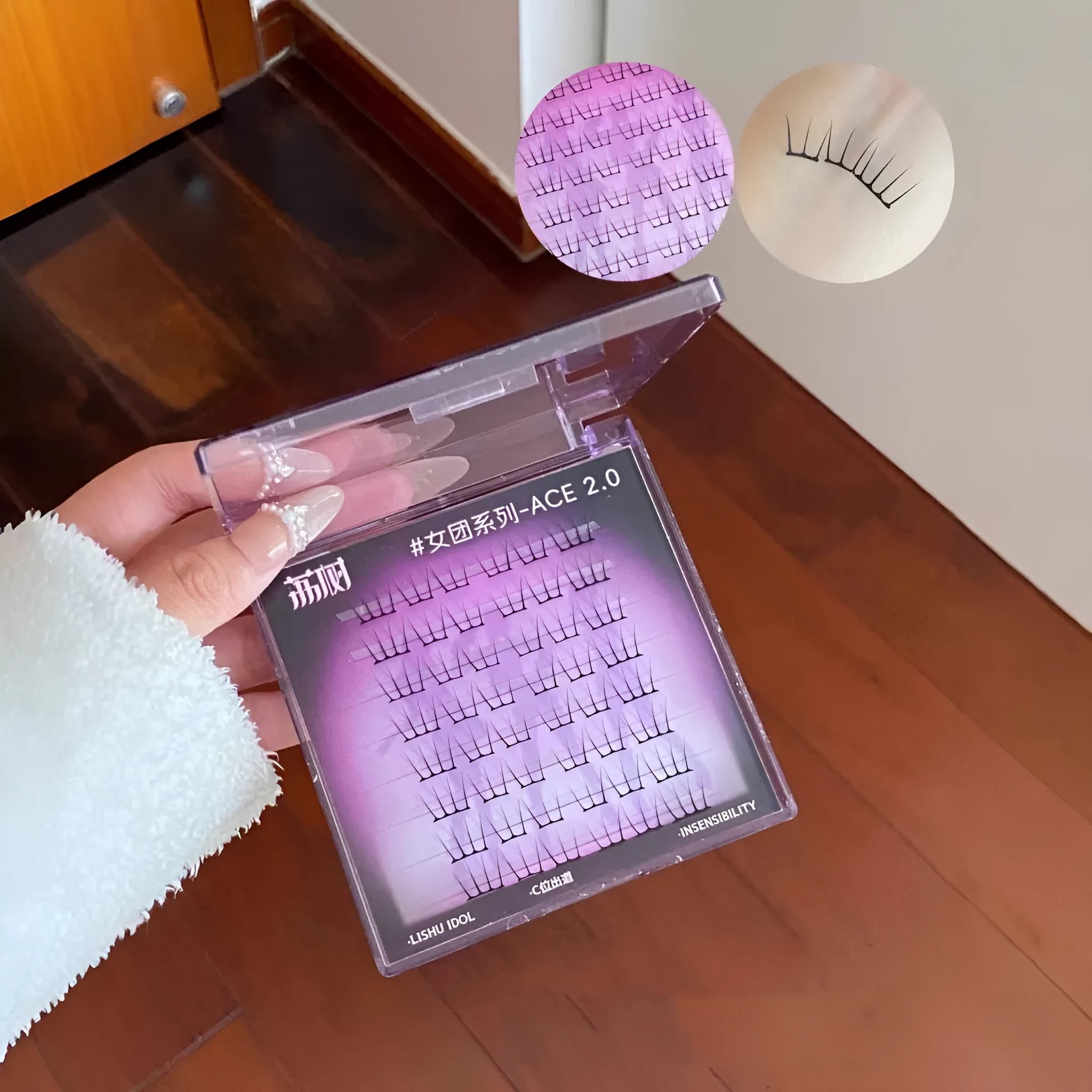 Reusable artificial fibre false eyelash clusters in cluster packaging with optional tweezers