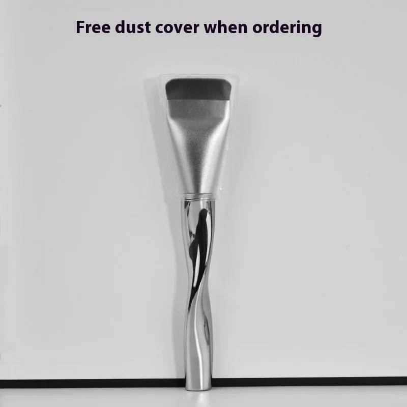 Spiral one-shaped powder foundation brush with long plastic handle on a black pineapple box