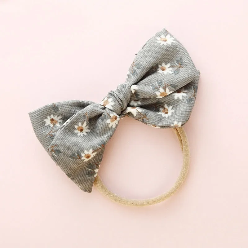 Children's knotted bow hair ring in cloth fabric with printed princess series design