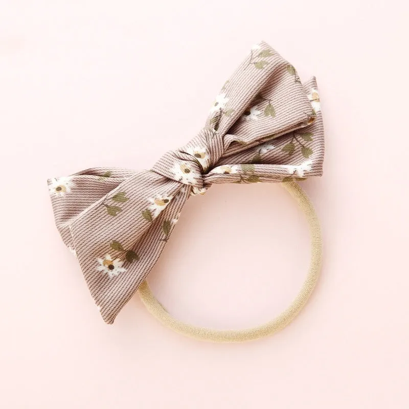 Children's knotted bow hair ring in cloth fabric with printed princess series design