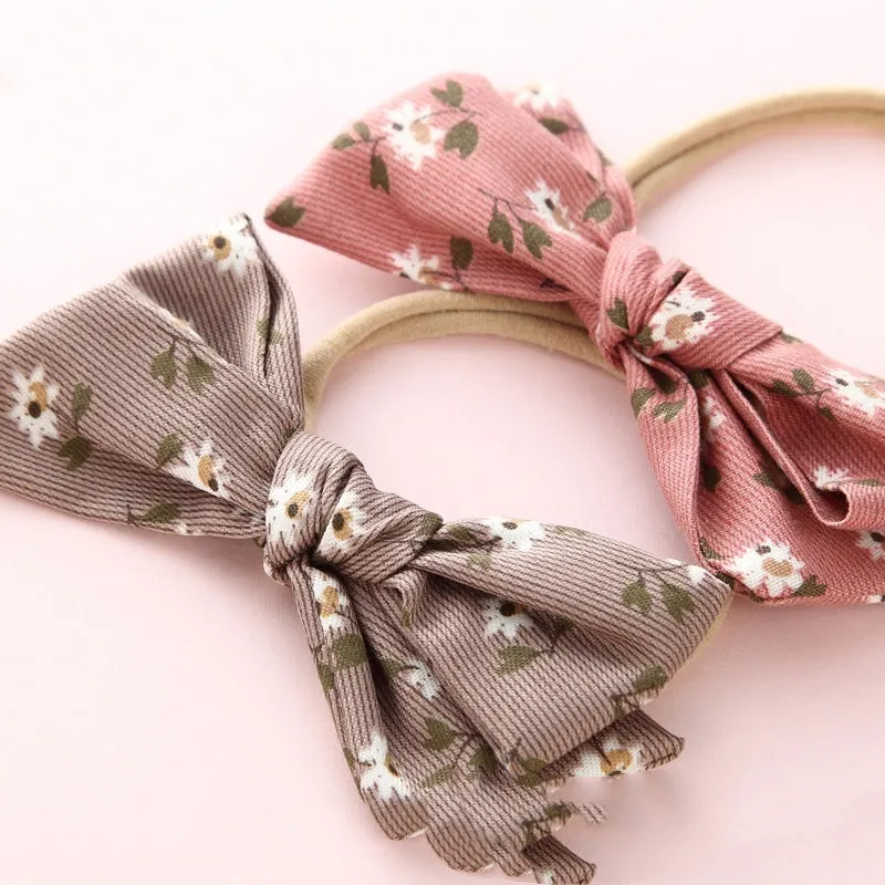 Children's knotted bow hair ring in cloth fabric with printed princess series design