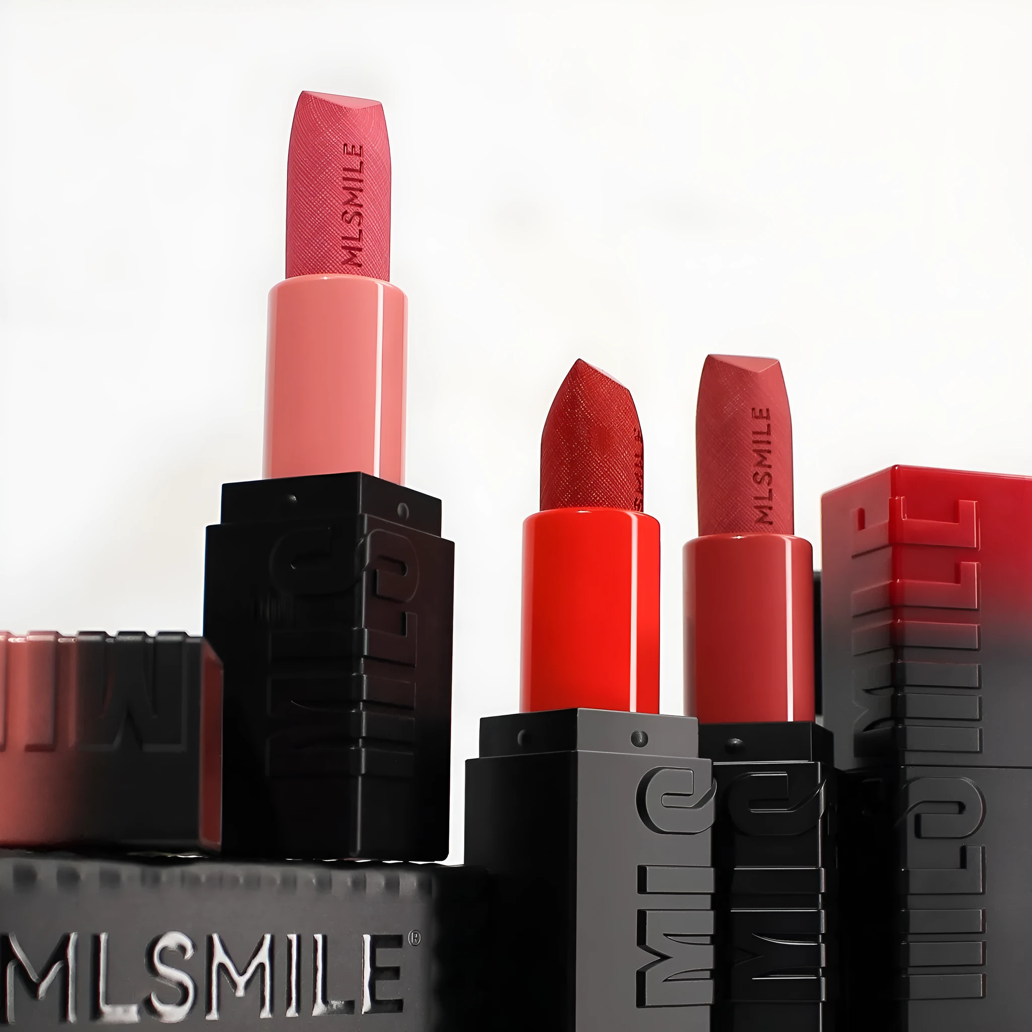 MLSMILE embossed lipstick set of three tubes in a 7.7cm x 6.8cm x 2.4cm box.