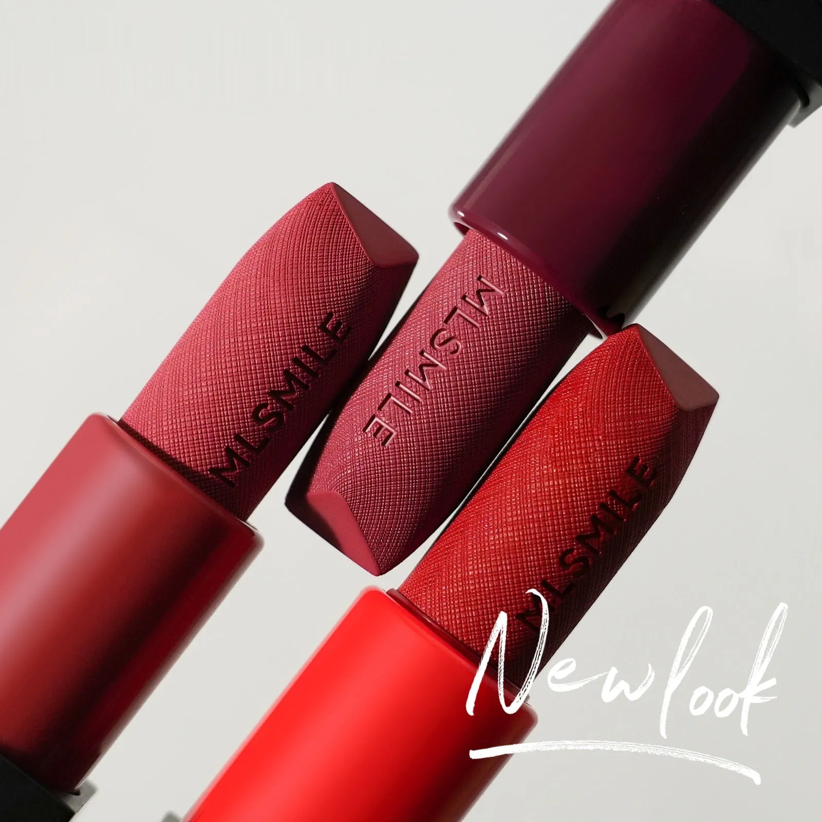 MLSMILE embossed lipstick set of three tubes in a 7.7cm x 6.8cm x 2.4cm box.