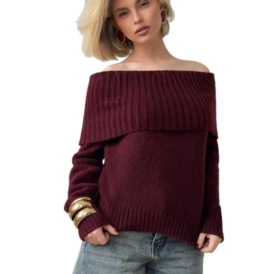 Woman wearing a grey off-the-shoulder sweater with a raised 3D texture pattern.