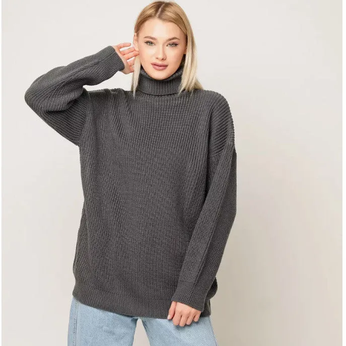 Women's loose fit high neck pullover sweater in solid sky blue colour, showing 3D textured pattern.