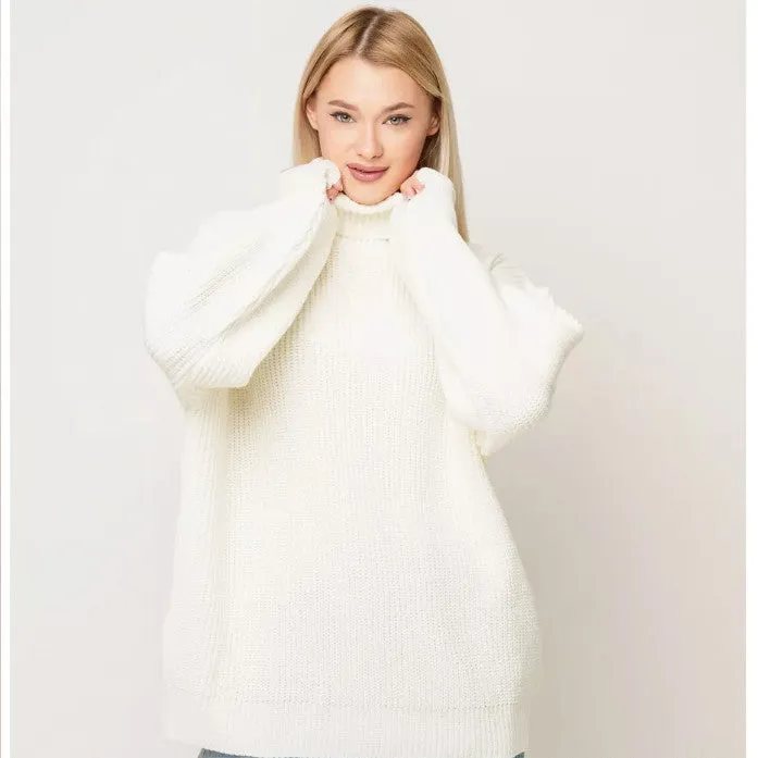 Women's loose fit high neck pullover sweater in solid sky blue colour, showing 3D textured pattern.