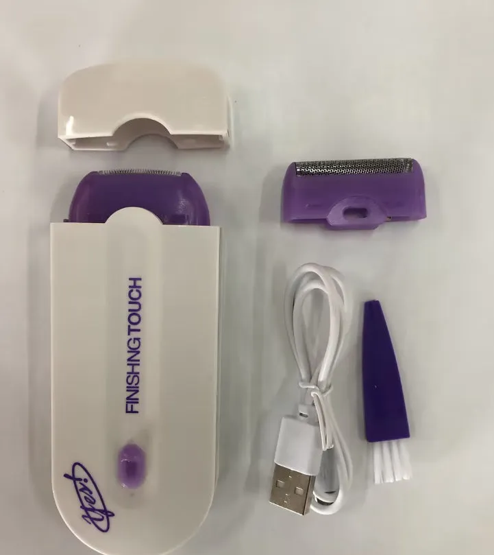 White electric hair removal shaver with foil head and trimmer head attachment on a blue background.