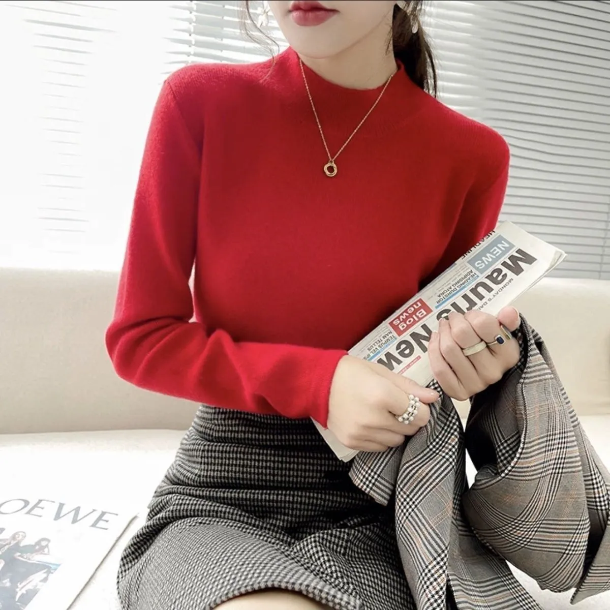 Slim fit long sleeve viscose top in apricot colour on a hanger