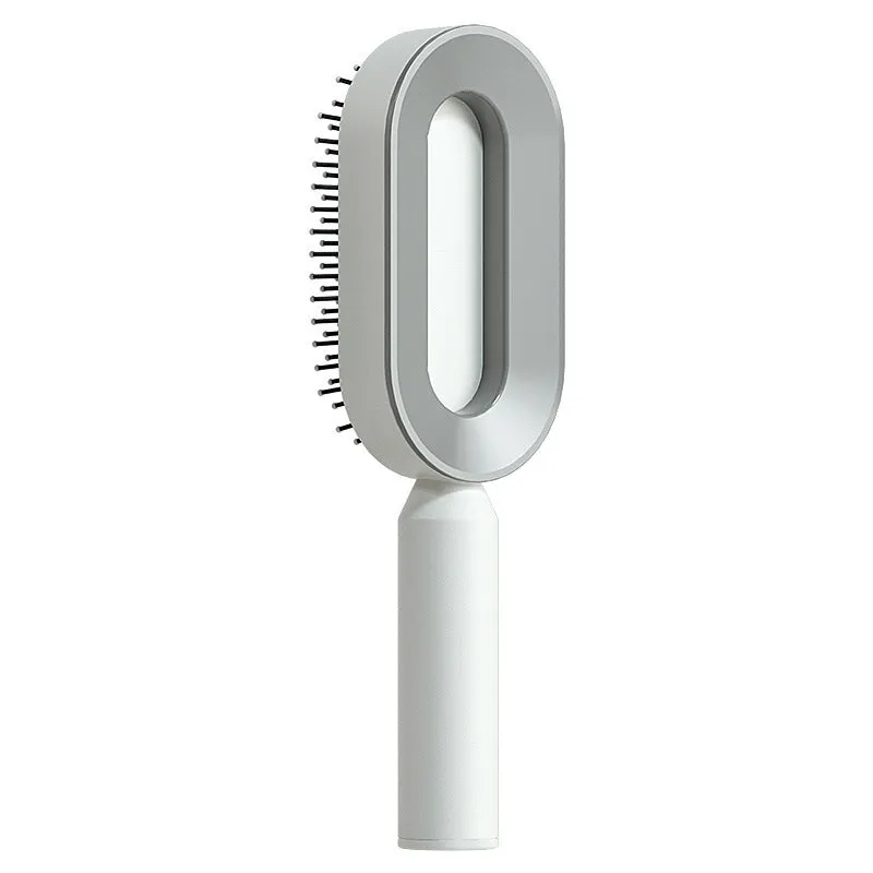 Self-cleaning hair brush with air cushion design in black gold, white, or black purple colours