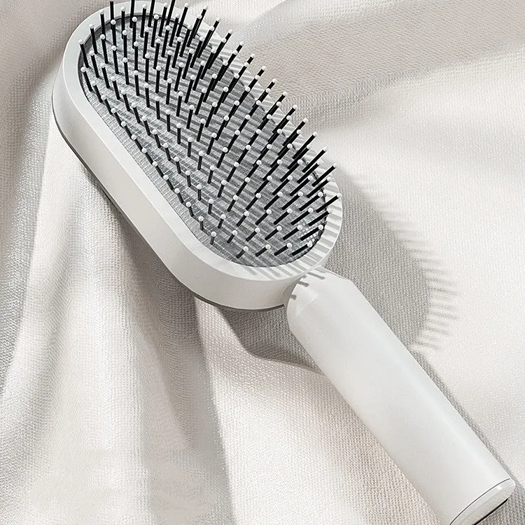 Self-cleaning hair brush with air cushion design in black gold, white, or black purple colours